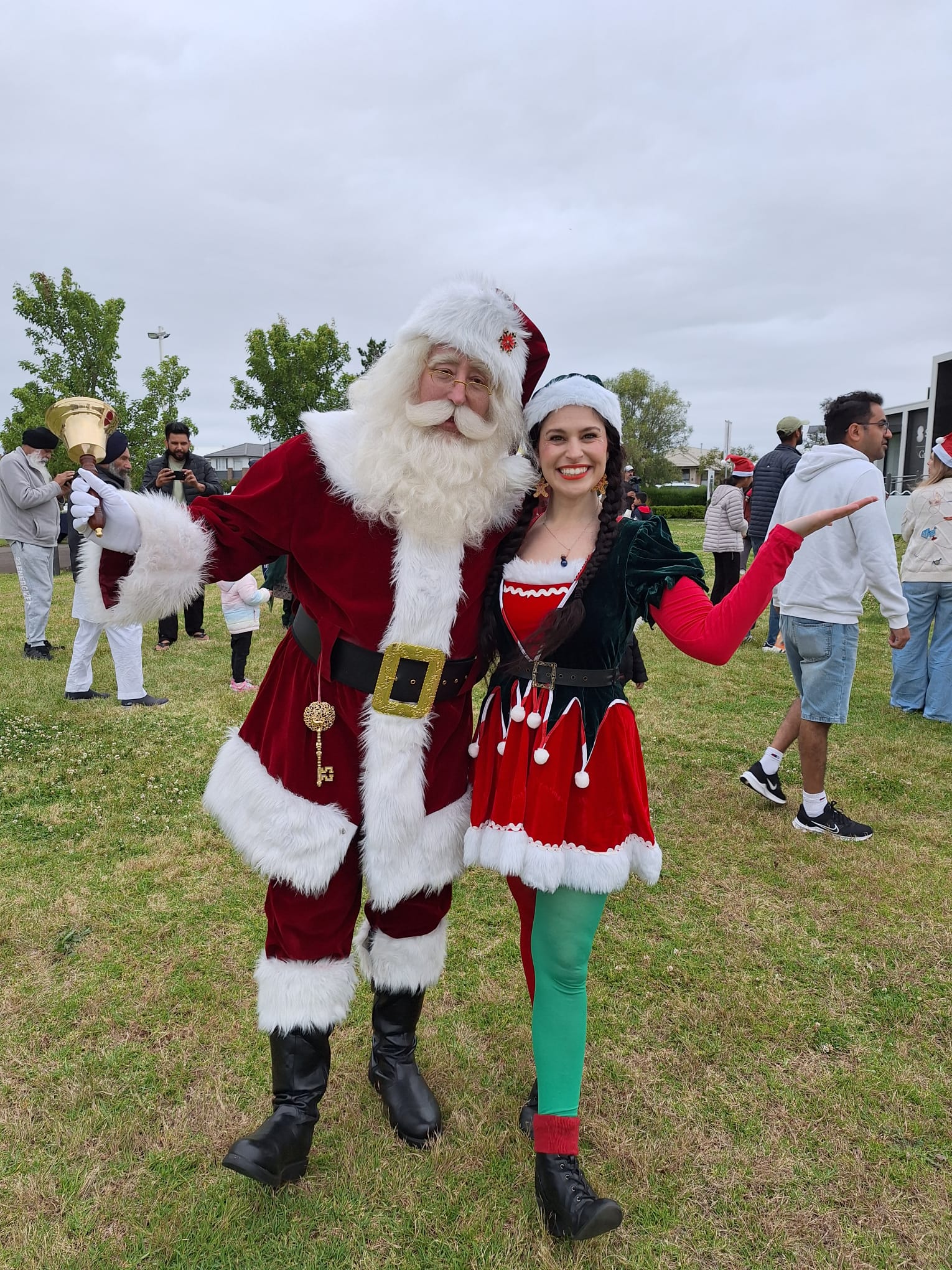 Santa with elf at community event