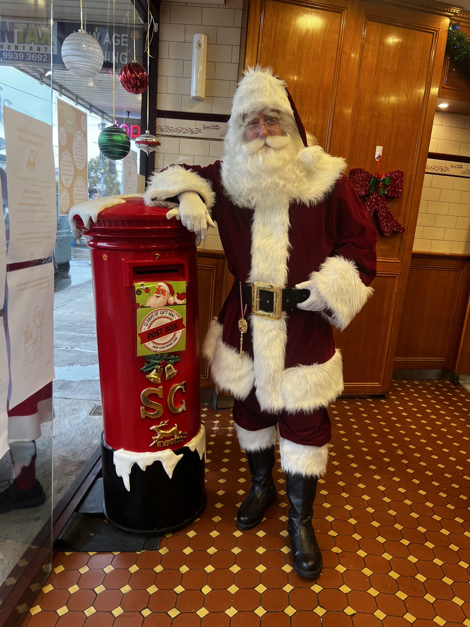 Santa with Christmas mailbox